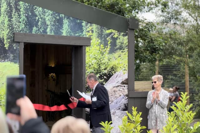 Deputy Lord Lieutenant William Webb officially unveils the new enclosure for Nigel the Puma.