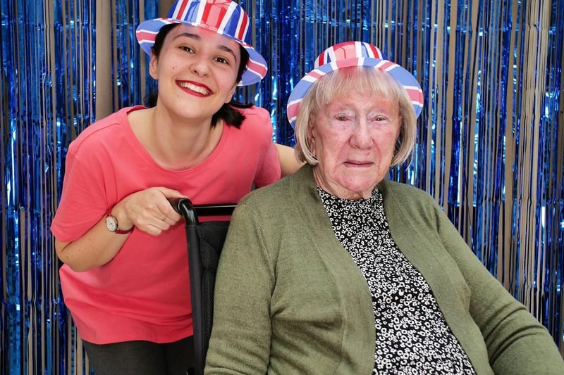 Team member Hannah Lebrecht with resident Edna Grant