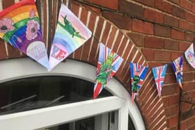 Home-made bunting from 2020 on the 75th anniversary.
