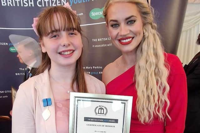 Summer receiving her award from Katie’s former Pussycat Doll Kimberley Wyatt.