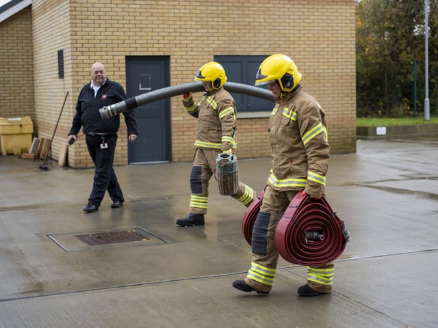 Would-be recruits are challenged to carry the heavy equipment needed at incidents. Photo: Holly Parkinson