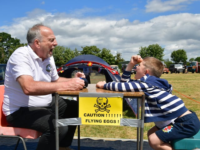 World President, World Egg Throwing Federation, Andy Dunlop demonstrating the Egg Roulette to Igor But 7 of Kiev, Ukraine