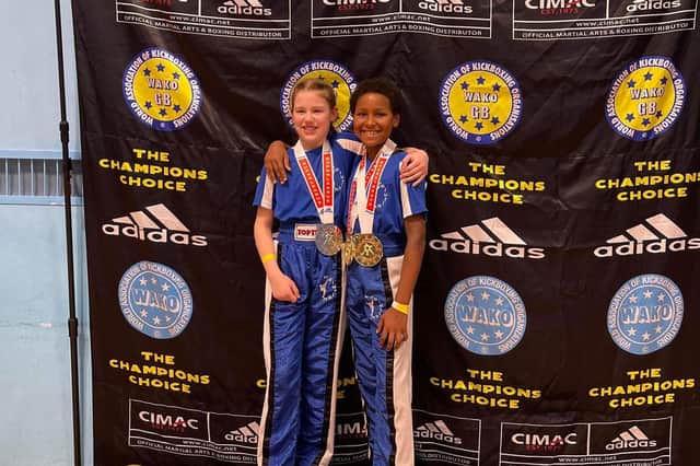 Jessica and Julia after sharing the podium in the Girls 8-10-year-olds Light Continuous Category.