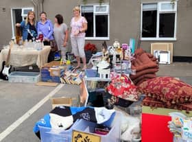 Churchwarden Stephanie Baines (left) with helpers at the Misterton car boot sale