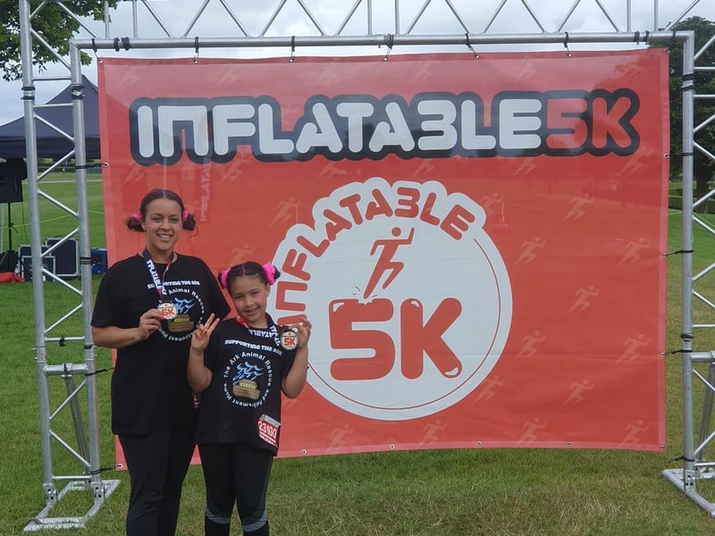 Laura and Belle completed the Inflatable Run.
