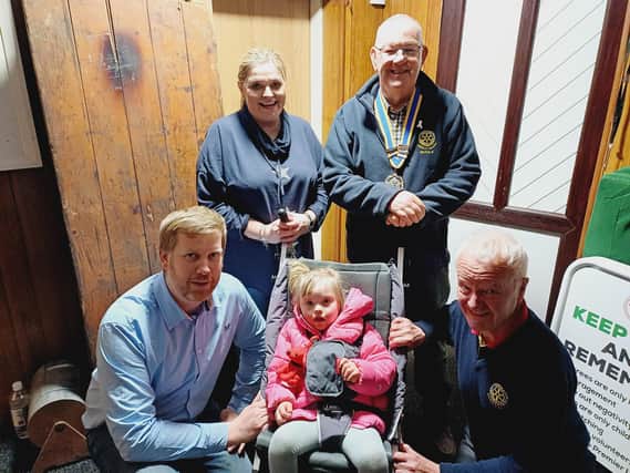 Theia and mum Rachelle with representatives from Market Rasen Round Table and Rotary. Image: Dianne Tuckett