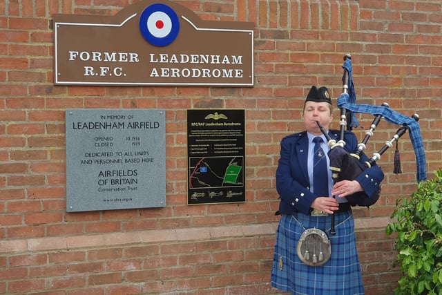 Bagpiper Kirsteen Macdonald performs for the unveiling ceremony.