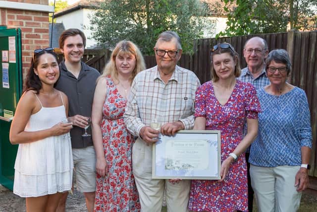 Coun Geoff Hotchkin with well wishers and his Freeman of the Parish certificate. Photo: George Frizzell Photography