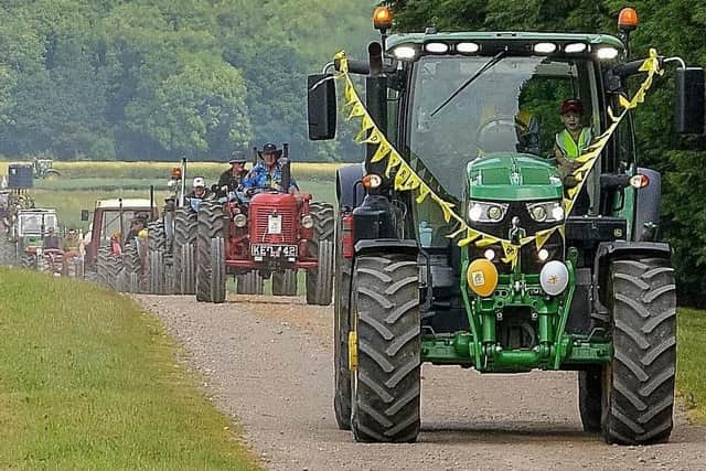 And they're off!.......the annual Lincolnshire Wolds Tractor Run takes to the road again. (PHOTO BY: Derek Bell Photography)