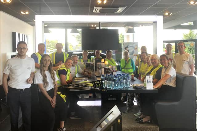 Listers Boston MINI staff with Wyberton Wombles team members.