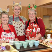Elaine Eccles, Marilyn Moore and Sue Binns serving refreshments