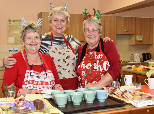 Elaine Eccles, Marilyn Moore and Sue Binns serving refreshments