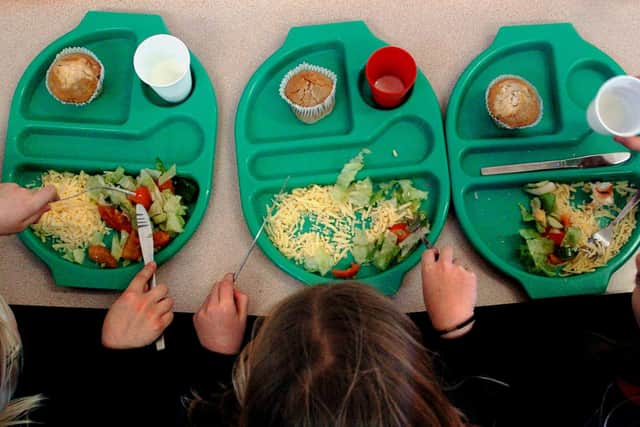 File photo dated 08/03/07 of children eating a school meal. Most children in Reception year in Wales will begin to receive free school meals from September, the Welsh Government has announced. Issue date: Monday June 20, 2022.