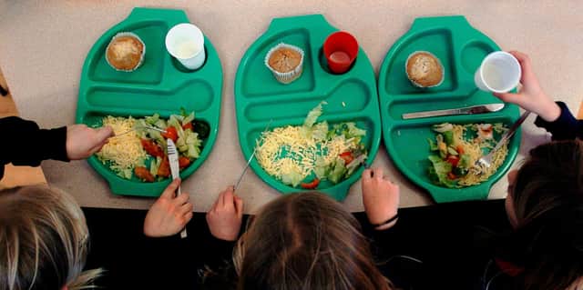 File photo dated 08/03/07 of children eating a school meal. Most children in Reception year in Wales will begin to receive free school meals from September, the Welsh Government has announced. Issue date: Monday June 20, 2022.