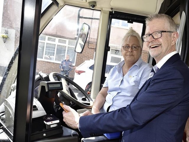 Coun David East gets on board the B617 in Billinghay. Photo: LCC