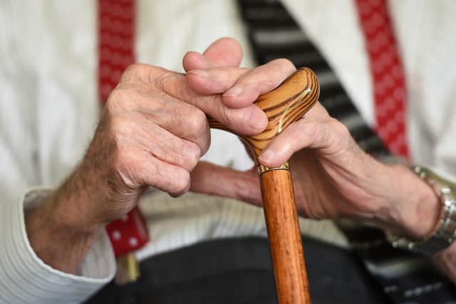 File photo dated 18/05/17 of an elderly man holding a walking stick, as three out of four care staff who look after people at home are not being paid for the time it takes them to travel between appointments, according to new research. Unison said its survey of more than 300 care workers across England revealed that employers are effectively breaking minimum wage laws, costing staff hundreds of pounds each month. Issue date: Thursday June 15, 2023.