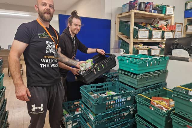 Tim Jones (left) back volunteering at The Storehouse Church food bank with Restore Centre and food bank manager Jonny Whelbourn.