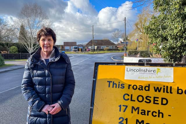 Coun Patricia Bradwell on site at the end of drainage improvement works in Kirkby on Bain.