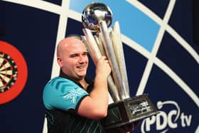 Rob Cross won £400,000 after winning the 2018 PDC World Darts Championships to complete a stunning transformation from 12 months ago. (Photo by Naomi Baker/Getty Images)