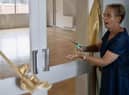 Jenny Harrison cuts the ribbon.
