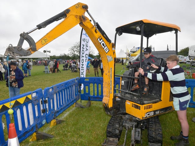Freddie Buckberry 15 of Helpringham, helping out on the Heckington and Sleaford Young Farmers stand.