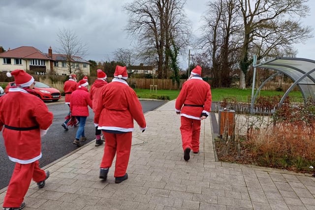 Santas head off on the fun run event