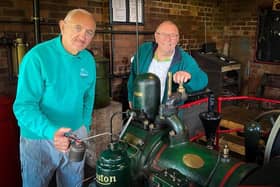 Volunteers Dave Hall and Alan Martin oiling the Ruston 7XHR diesel engine that will be at work at Sunday's event (PHOTO BY: Chris Frear)