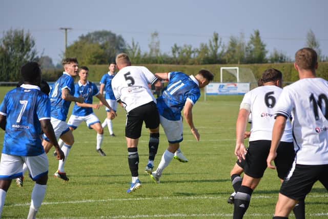 Action from Louth's home defeat by table-topping Horbury.