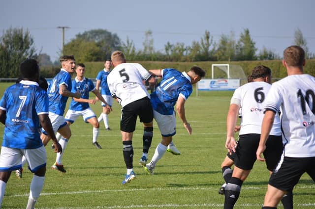 Action from Louth's home defeat by table-topping Horbury.
