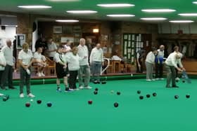A busy session in the bowls club