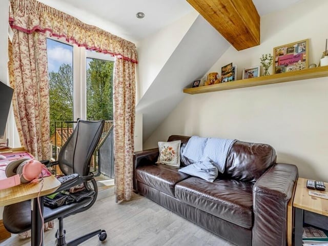 The lounge in the flat, with balcony.