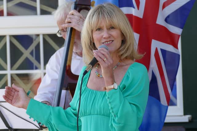 Joanne Shields and the Little Big Band performing on stage.