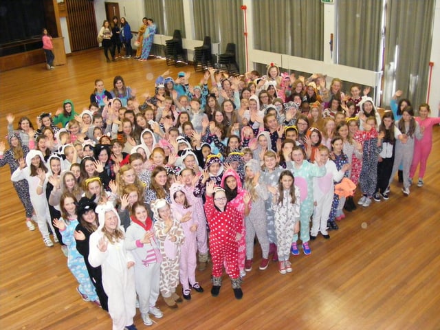 Pupils from Kesteven and Sleaford High School raising funds for Children In Need by swapping school uniforms for onesies.