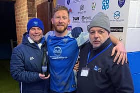 Paul Miles and Michael Gooderson present Luke Wilson with the man of the match award against Shirebrook