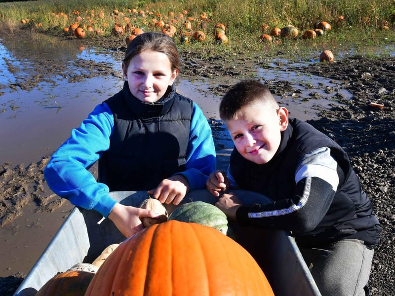 Mai and Max Hilton with their pumpkins picked from one of the two fields on site.