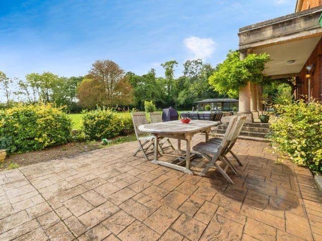 An area of terrace outside the front of the home.