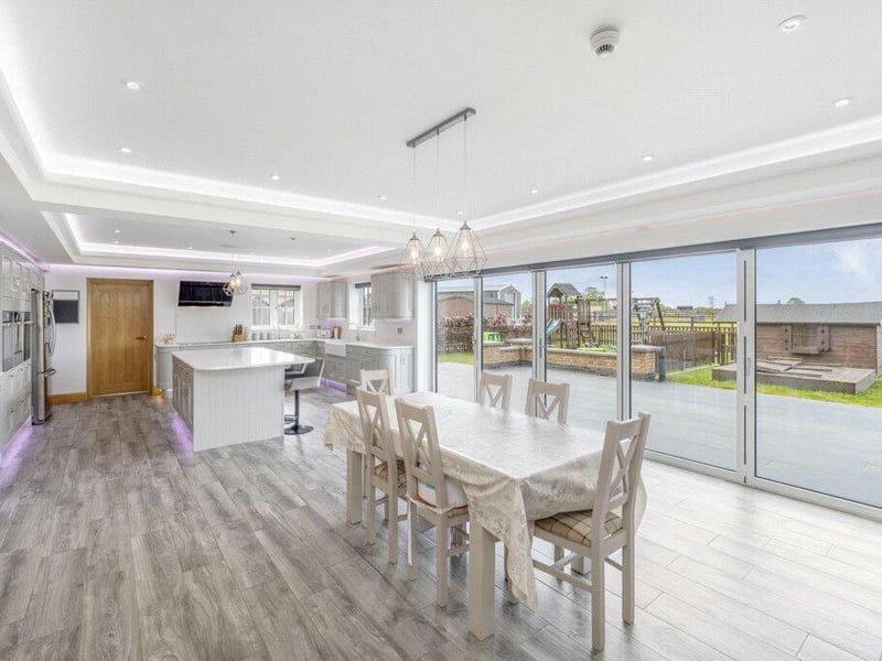 One end of the open-plan kitchen dining living room.
