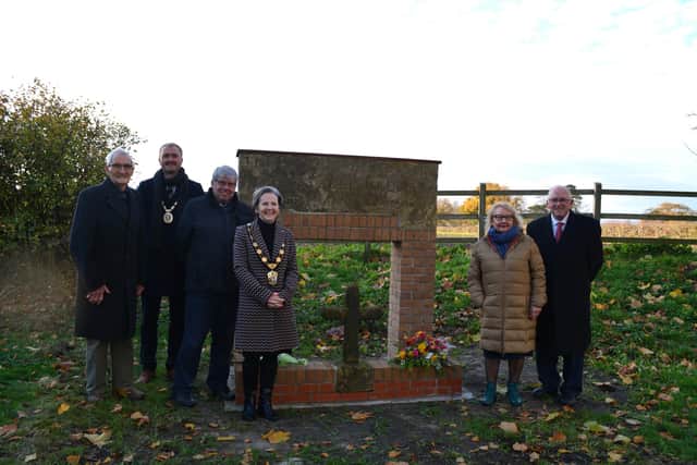 The dedication of the memorial back in November, with Alan Dennis far right