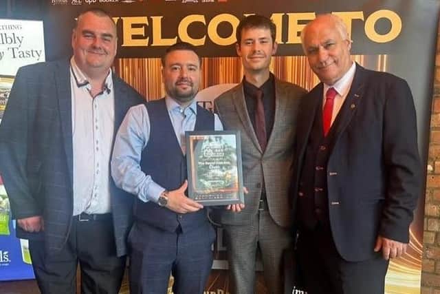 The award is collected by (from left) head chefs Karl Green and Ronnie Wolfe, restaurant supervisor Alfie Trewick and joint manager Jeff Jafari.