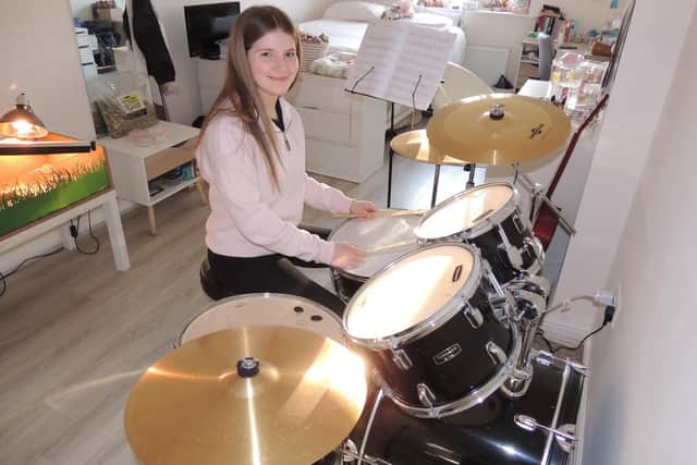 Abbie Day, 14, is preparing for a 12-hour drum-athon fundraiser.