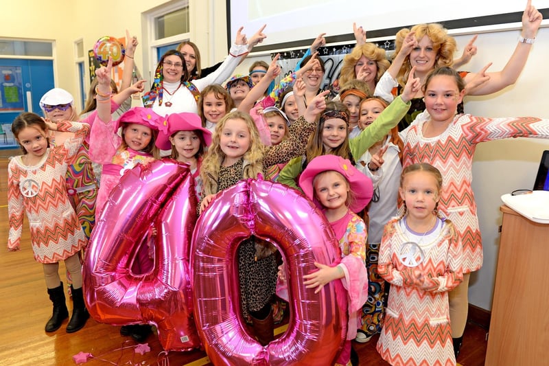 Tattershall Primary School celebrating its 40th birthday with a 70s-themed party. All staff and children were invited to dress up in the type of clothes that would have been in fashion when the school was opened in 1973.