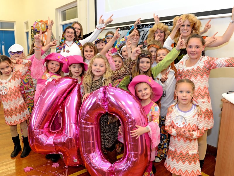 Tattershall Primary School celebrating its 40th birthday with a 70s-themed party. All staff and children were invited to dress up in the type of clothes that would have been in fashion when the school was opened in 1973.