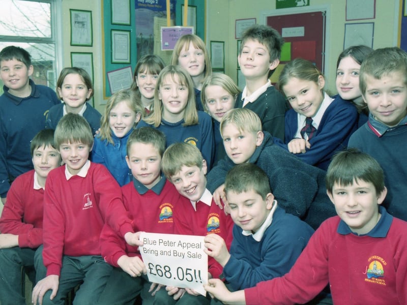 Swineshead Primary School lending its support to the Blue Peter Bring and Buy New Life appeal. Pictured are some of the organisers and customers who helped raise £68.05 for the cause.