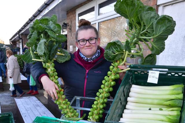 Phoebe Kift of Sibsey, selling vegetables at the Heckington Pavilion market.