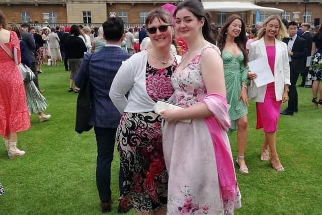 Former student Jenny with Duke of Edinburgh Award co-ordinator Mel Walker at Buckingham Palace.