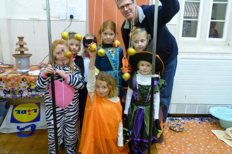 Caistor Methodist Church's Bright Light Bash - an alternative to the darkness of Halloween. Pictured are The Rev Andrew Lomax with Erin Hoy, Kitty Macpherson, Martha Bates Jessica Whall, Melissa Hewitt, Edith Bates and front Anaia Collinson.