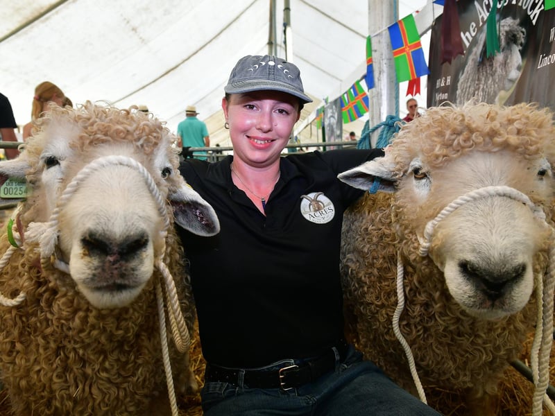 Holly Norton with her Lincoln Longwool sheep, Arthur and Alfie of The Acres Flock, Wragby. Photo: David Dawson