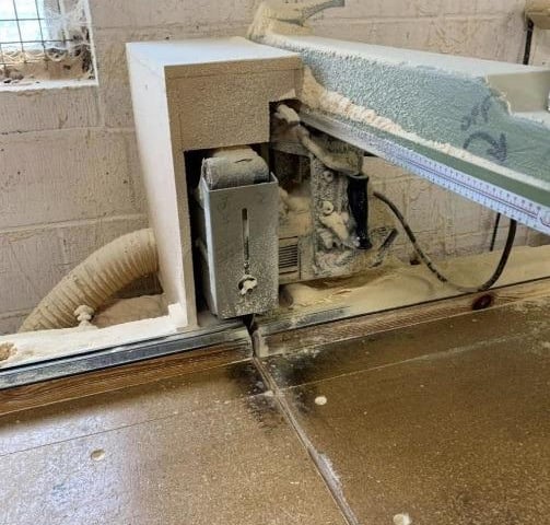 Dust coating the crosscut saw and bench at The Furniture Chest, Heckiington. Photo: HSE