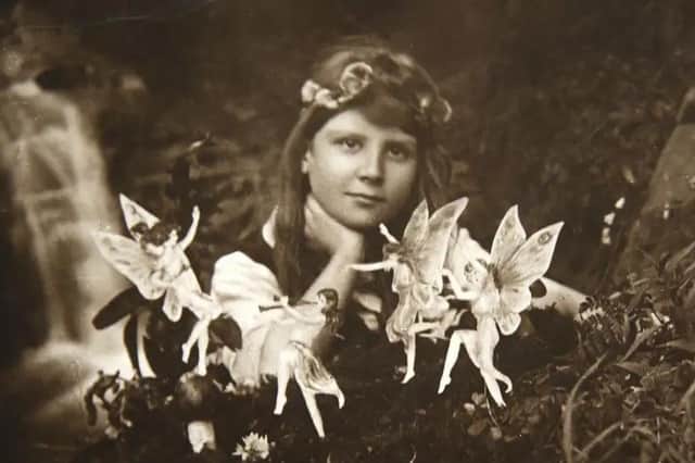 One of the photos, showing nine-year-old Frances Griffiths purportedly interacting with magical fairies in her garden. (PHOTO BY: David Whittaker)