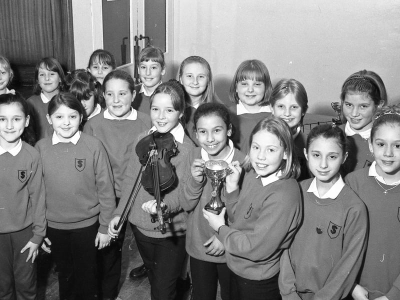Podium toppers St Thomas' School's Millennium Minstrels show off their spoils after coming out top of their group in the Boston Rotary Club Young Musician Competition.